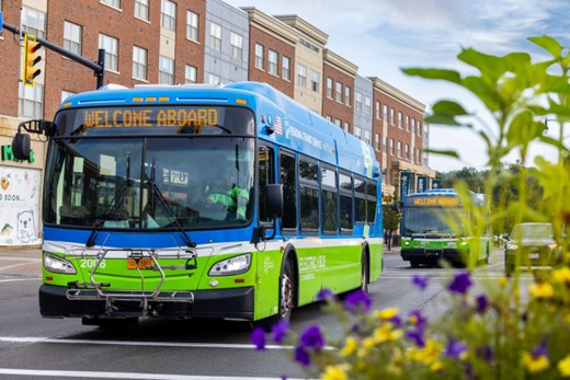 RTS buses driving on the road with the words "Welcome Aboard"