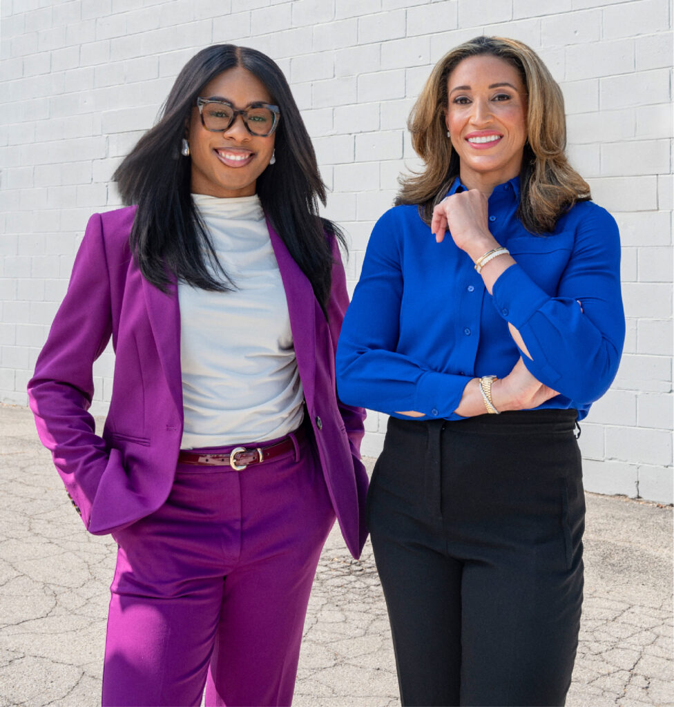 Taelor Jackson and Erin Tolefree smiling for a photo