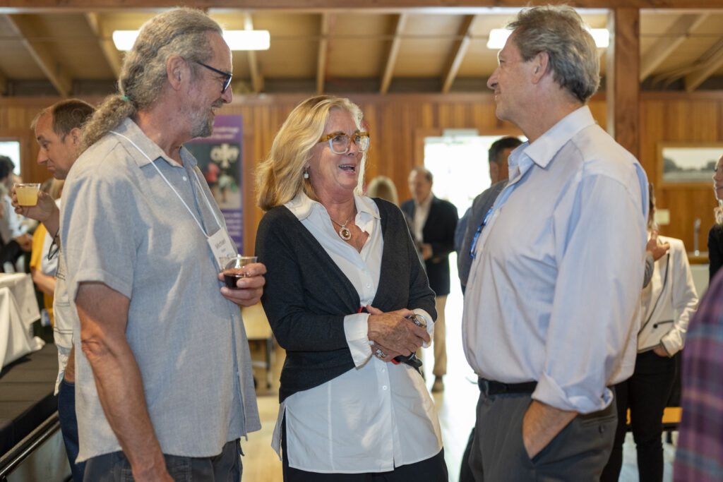 three people talking at Yates County Endowment reception