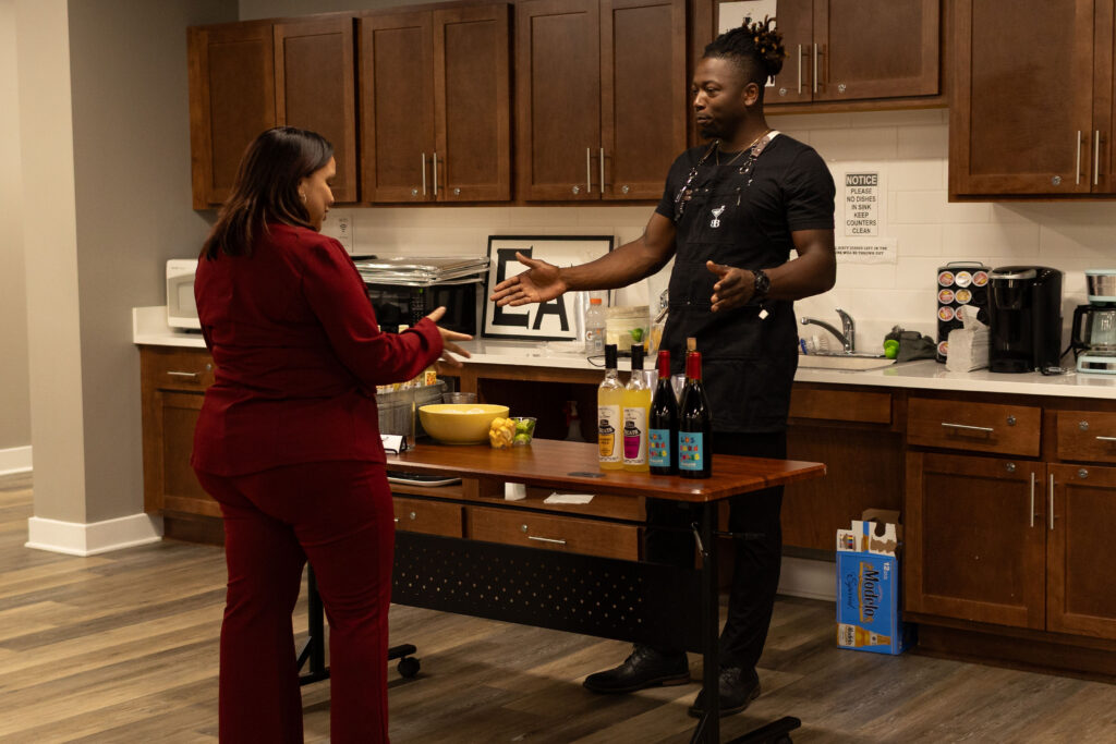 bartender making custom cocktails for guests