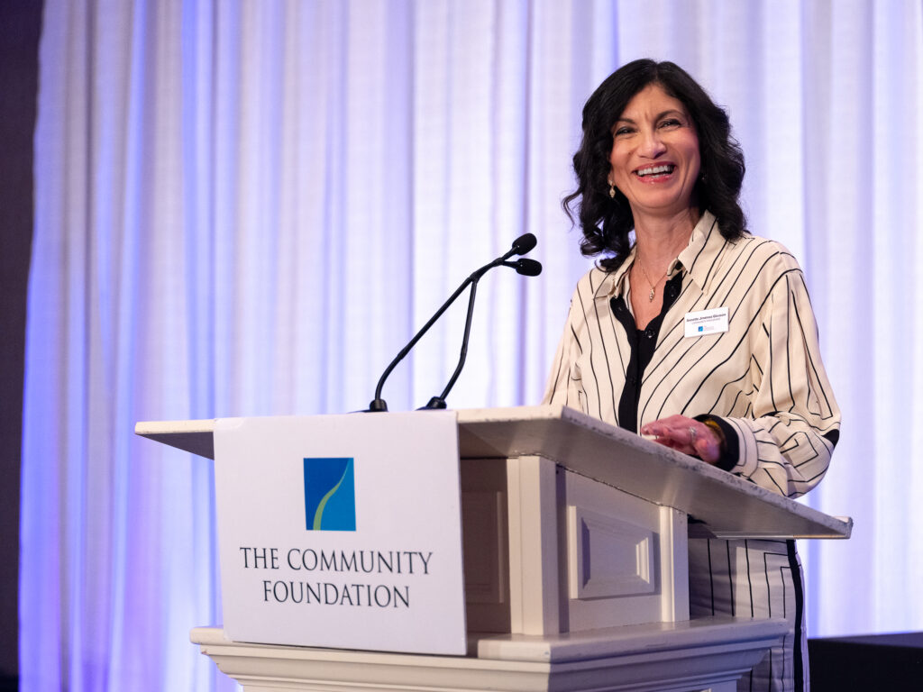 Annette speaking at Celebration of Giving