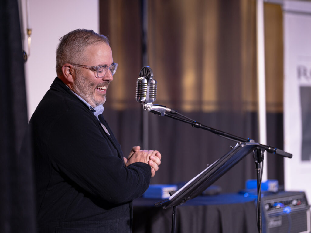 Andrew speaking at Evening Out with Jazz