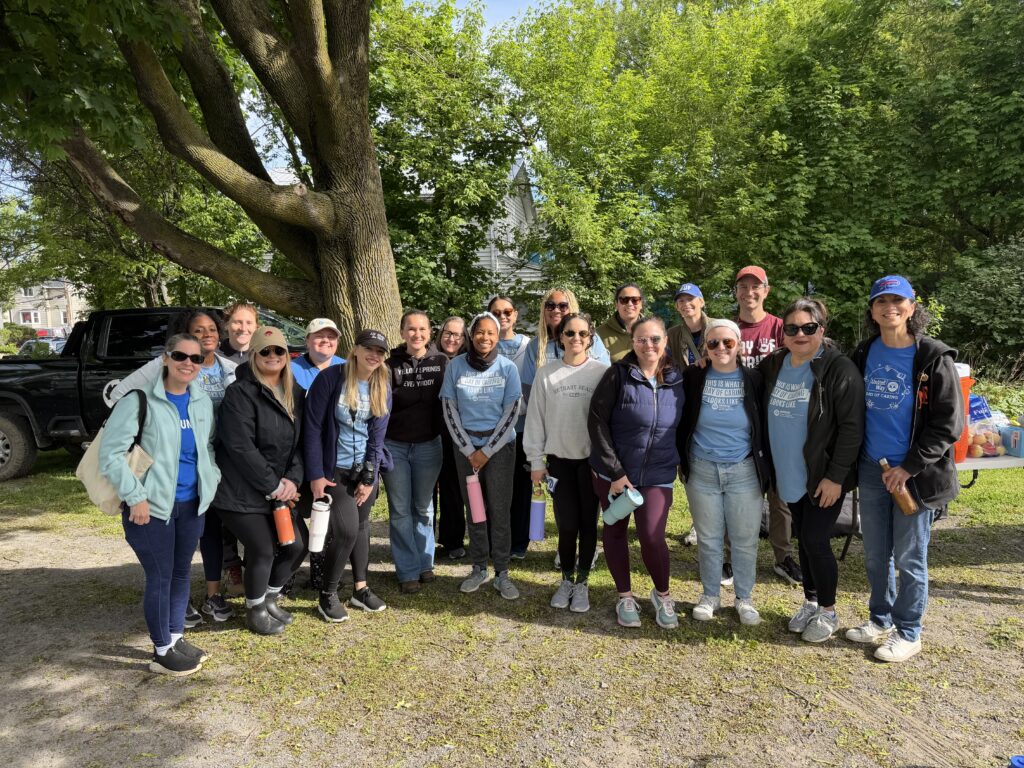 staff smiling for day of caring photo